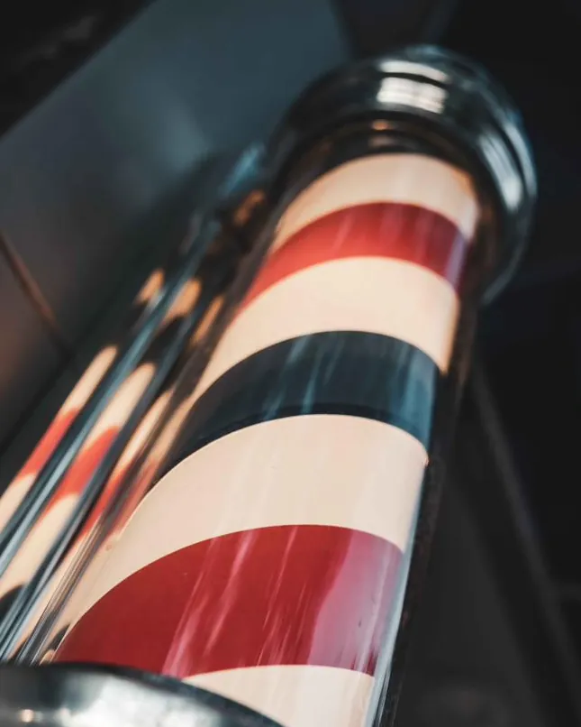 A red, white and blue barber pole