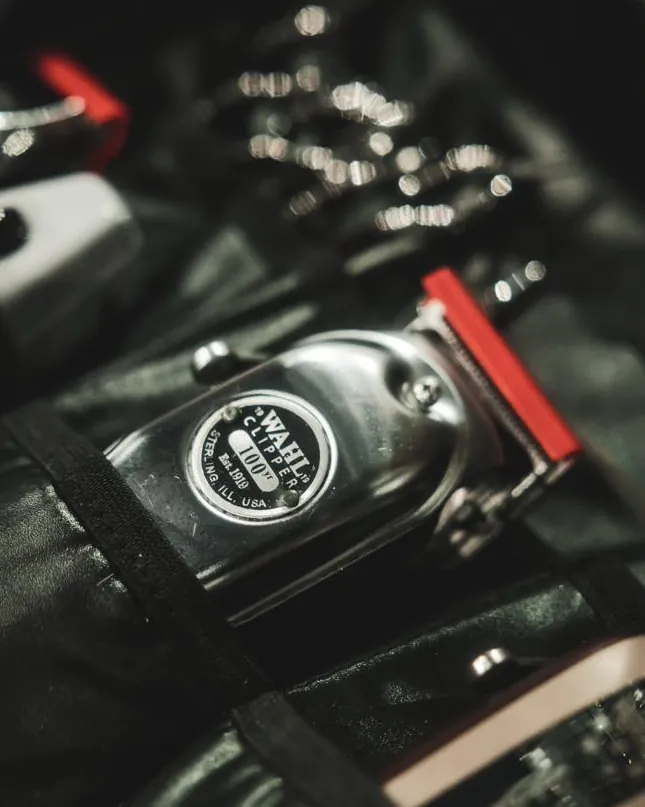 Close-up of barber clippers at a station